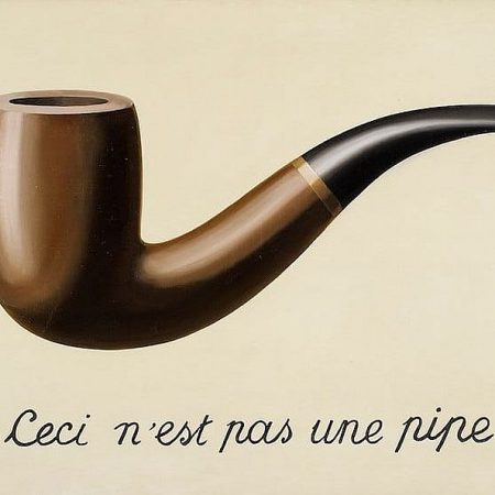 The Treachery of Images (1929) - René Magritte